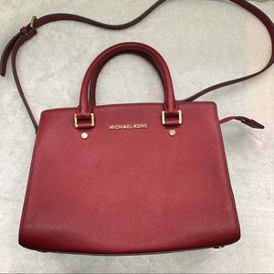 Michael Kors burgundy tote bag with gold hardware